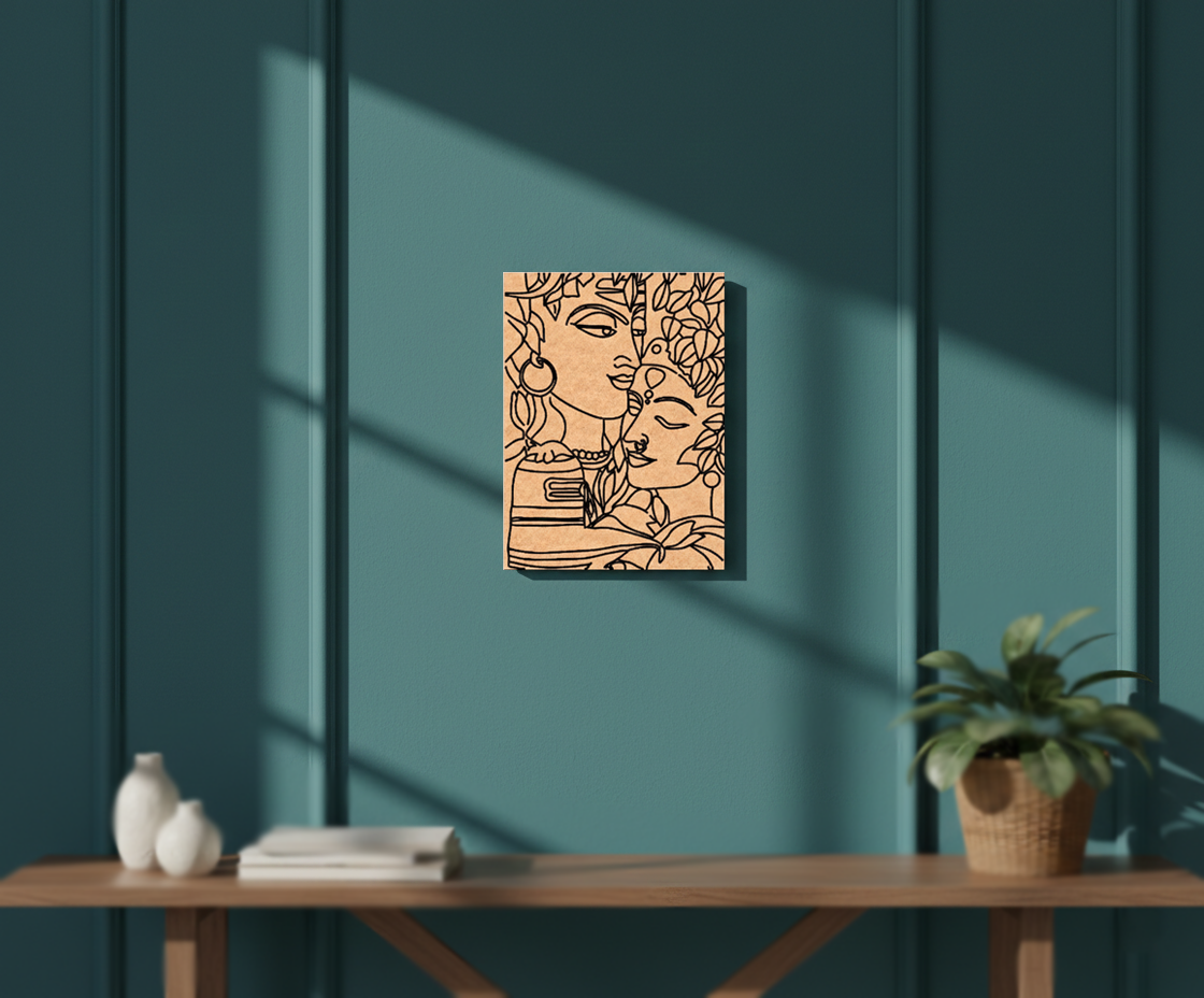 Abstract MDF DIY artwork on a teal wall with a wooden table and plant below.