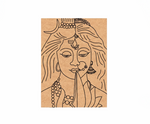 MDF DIY wall art with a stylized face design on a white background