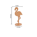 MDF flamingo figurine with measurements on a white background