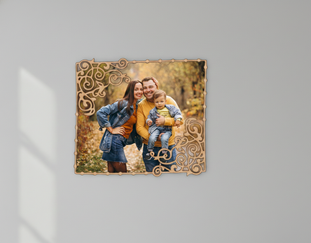 Decorative photo frame with a family picture on a gray wall
