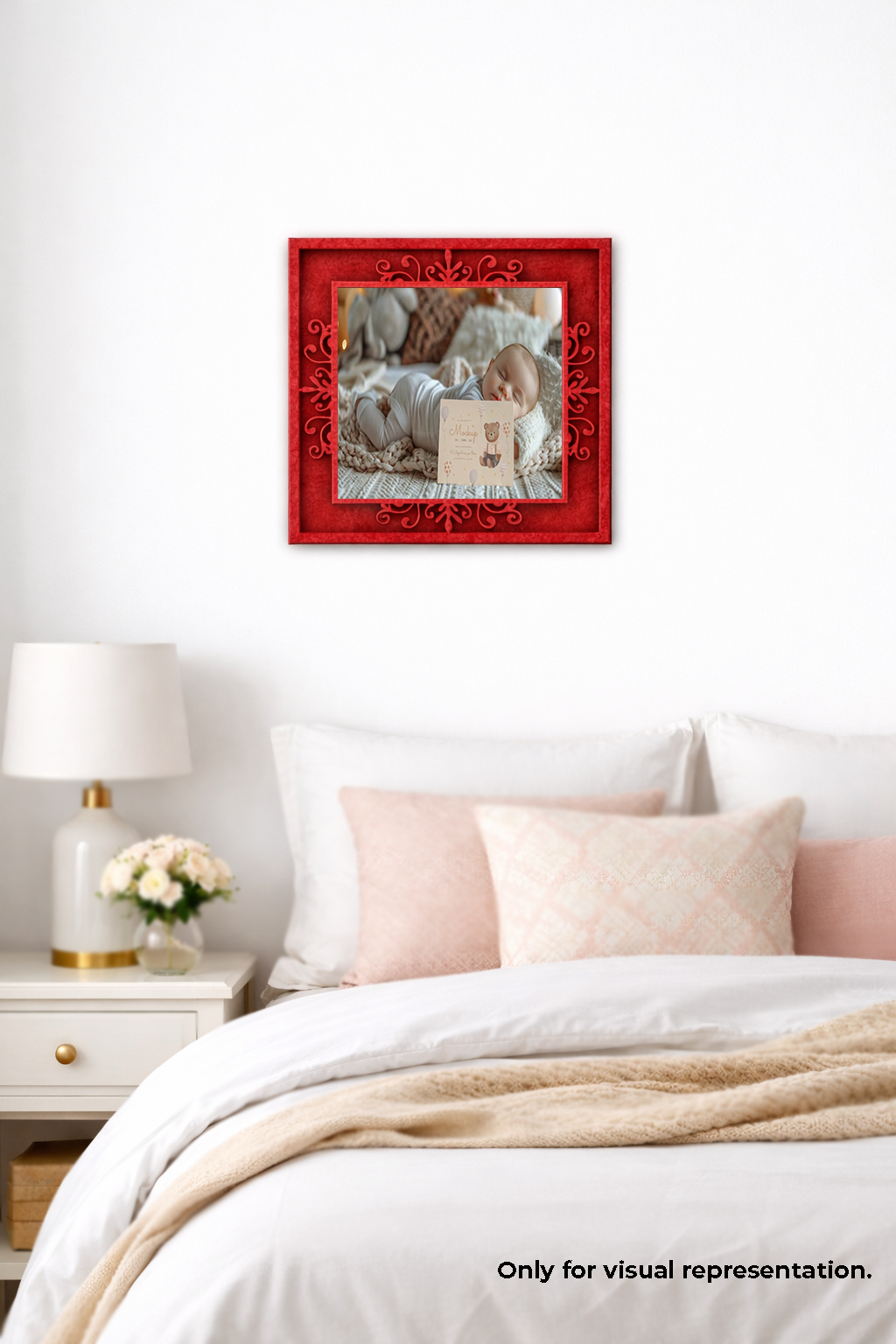 Red decorative photo frame on a wall above a bed with white bedding and pink pillows.