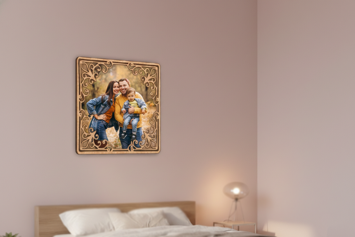 Framed family photo on a wall above a bed