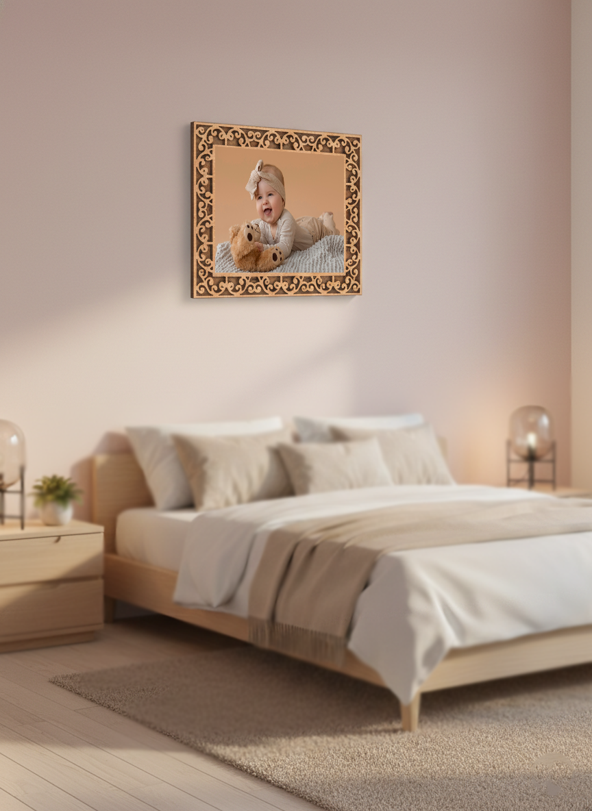 Bedroom with a bed and a framed picture of a baby on the wall.