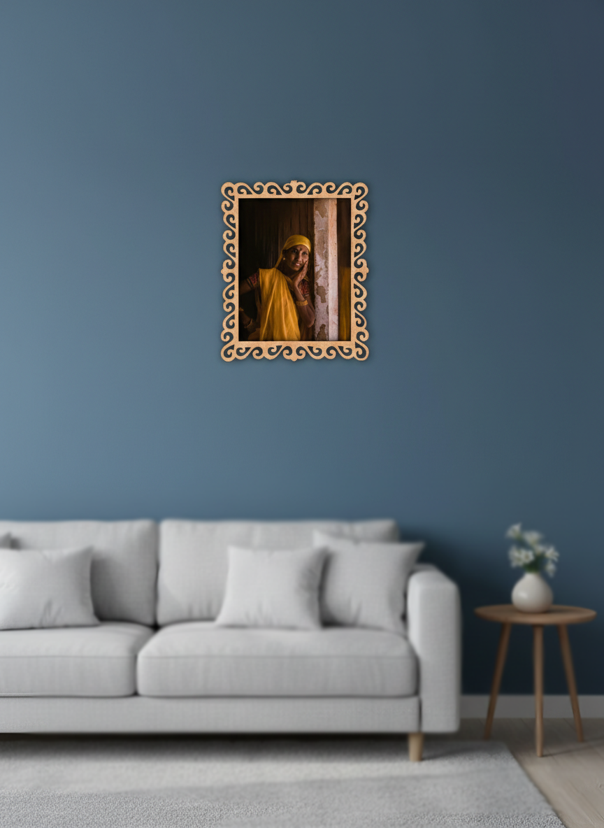 photo Framed artwork on a blue wall above a sofa