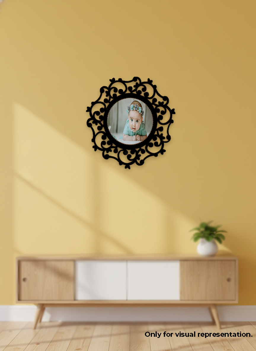 Decorative photo frame with a child's photo on a yellow wall above a wooden cabinet.