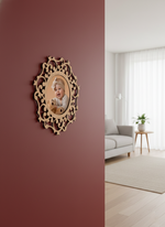 Decorative photo frame with a child's photo on a pink wall, living room in the background