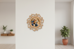 Decorative photo frame with a photo of a couple on a white wall.