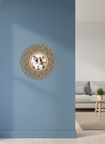 Decorative  floral photo frame on a blue wall in a living room.