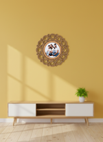 Decorative photo frame with a family photo on a yellow wall above a wooden entertainment console.