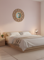 Neatly made bed in a bedroom with decorative photo frame above it.