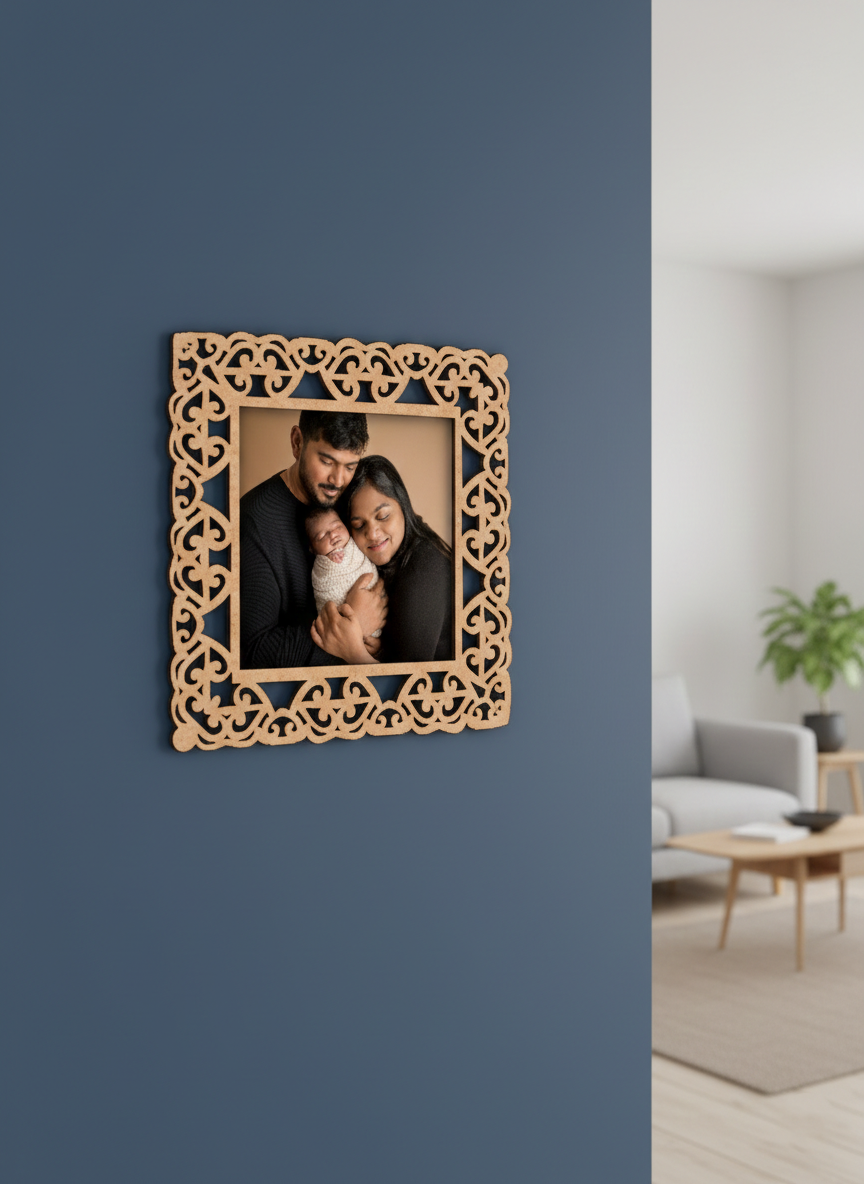 Decorative photo frame with a family portrait on a blue wall in a living room.