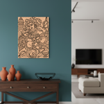 Decorative  MDF DIY wall art of two figures on a teal wall above a wooden console table.