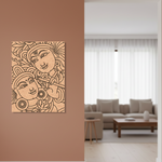 Decorative MDF DIY wall art of two faces on a brown wall in a living room.