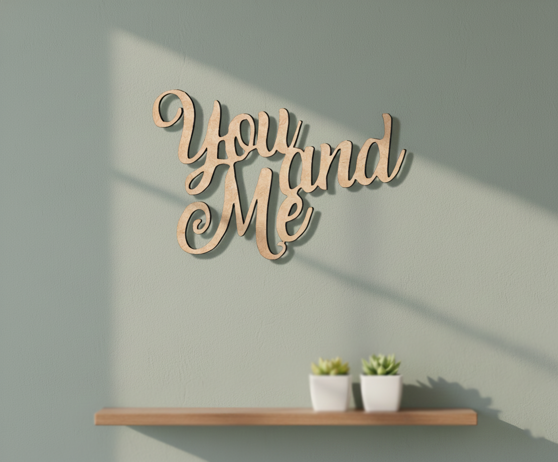 Unpainted MDF You And Me quote DIY cutout for wall decor and craft projects, mounted on wall