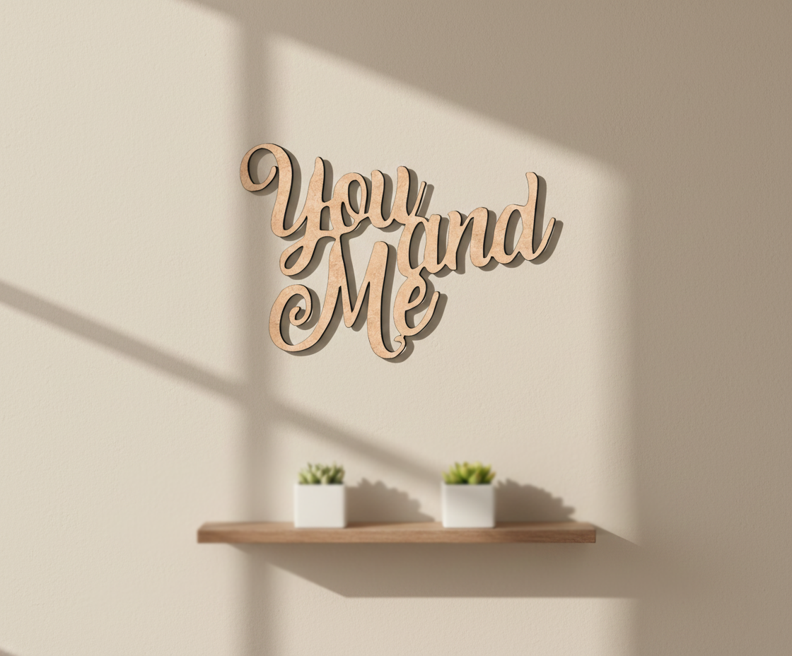 Unpainted MDF You And Me quote DIY cutout for wall decor and craft projects, mounted on wall