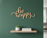 Unpainted MDF Be Happy quote DIY cutout for wall decor and craft projects, mounted on wall