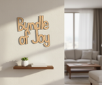 Unpainted MDF Bundle Of Joy quote DIY cutout for wall decor and craft projects, mounted on wall