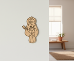MDF DIY wall decor of a stylized figure on a plain wall with a blurred room background.