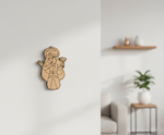 MDF DIY  wall decoration of a cartoon character on a white wall with a blurred living room in the background.