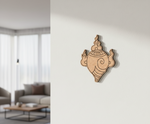 Decorative  MDF DIY  wall art on a plain wall with a blurred living room in the background
