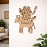  MDF DIY  wall art of a deity riding a bull on a white wall.