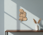  MDF DIY wall art  of a figure on a wall with a vase and dried plants on a table below.