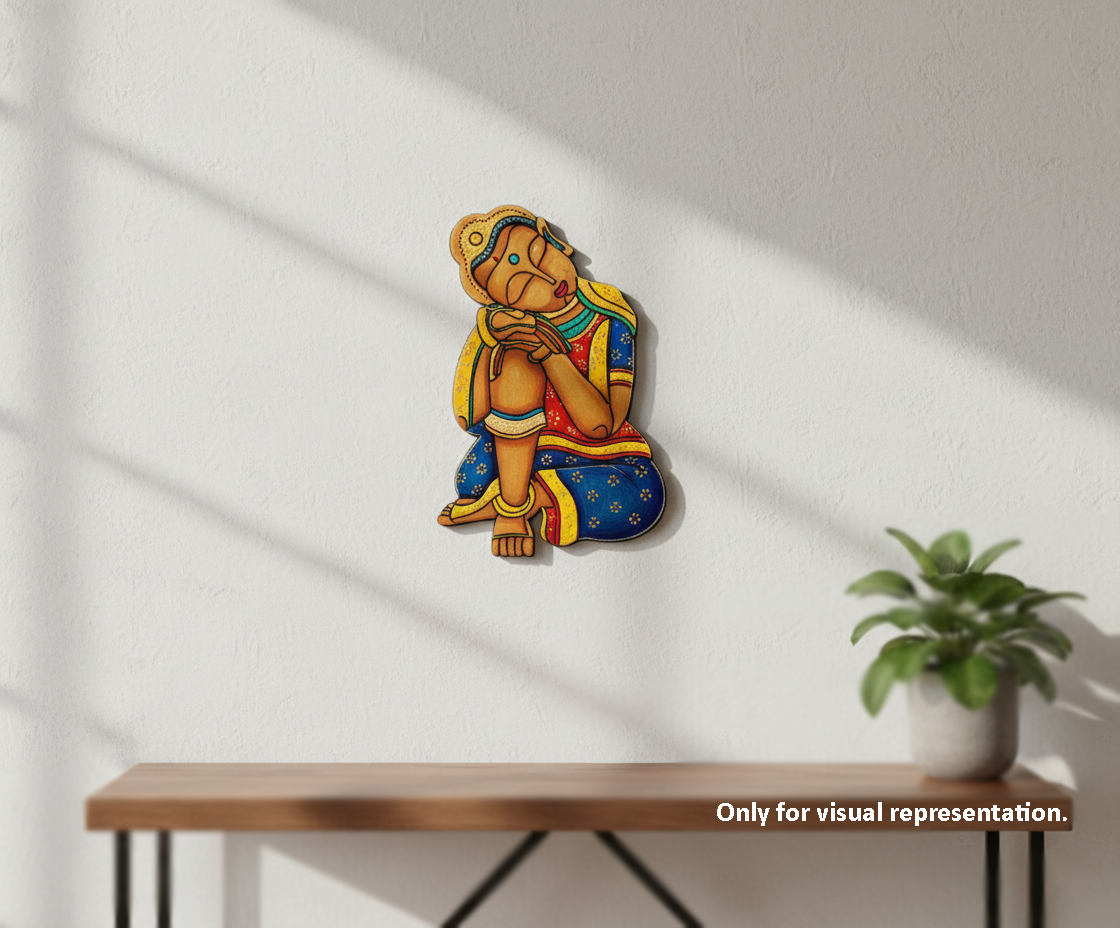Decorative  MDF DIY wall piece of a colorful figure on a white wall with a plant and table in the background.