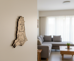  MDF DIY  wall art of a god face on a white wall in a living room.
