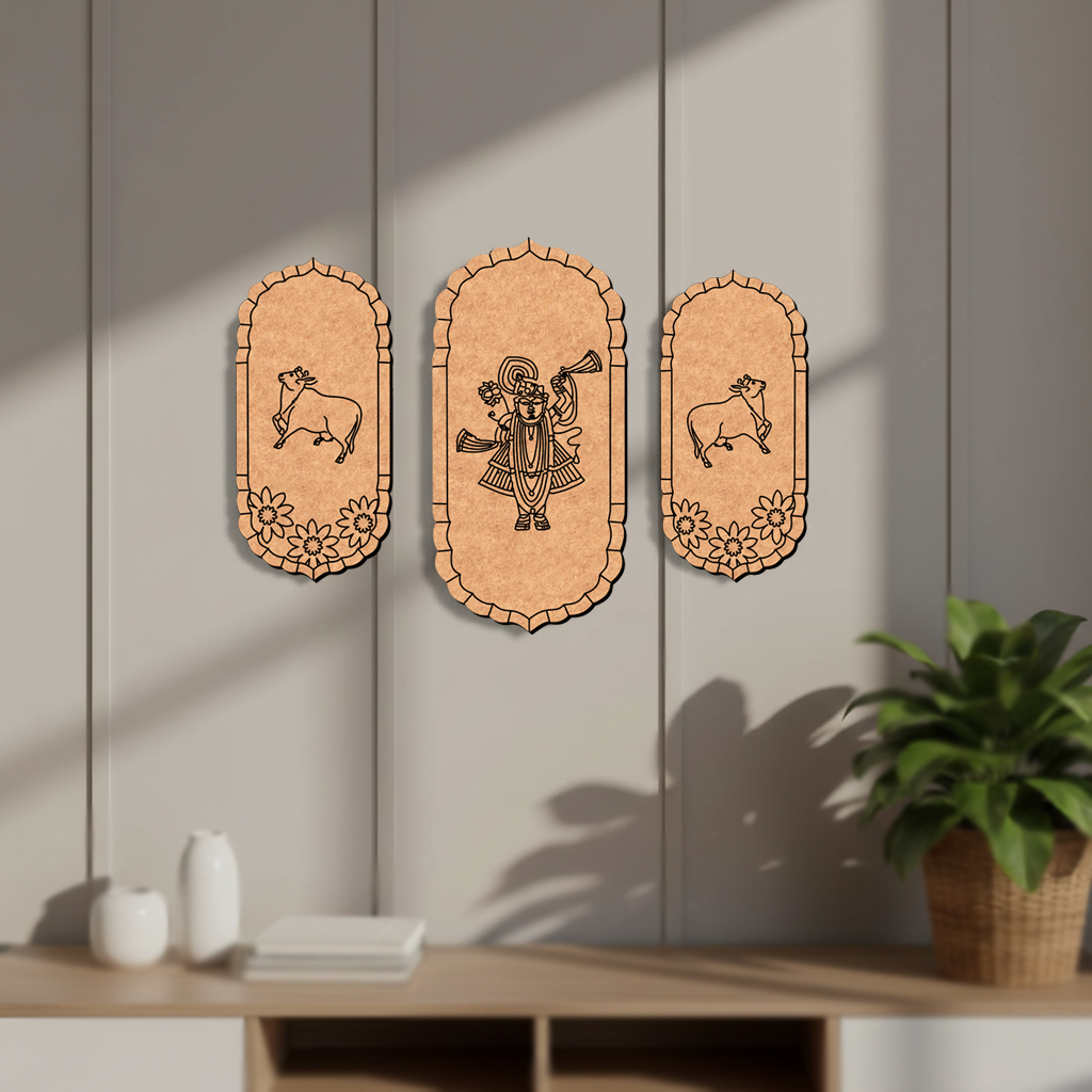 Three decorative  MDF DIY wall hangings with tribal designs on a neutral wall.