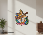 Decorative  MDF DIY wall art of a woman playing a stringed instrument with peacocks on a white wall.