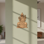  MDF DIY  statue of a seated figure on a light green wall with shadows