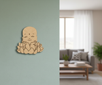  MDF DIY wall decoration of a smiling Buddha figure on a light green wall, with a blurred living room in the background.