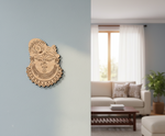 Decorative  MDF DIY wall art on a light blue wall with a living room in the background
