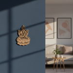 Decorative  MDF DIY  wall art of a seated figure on a lotus flower in a living room setting.