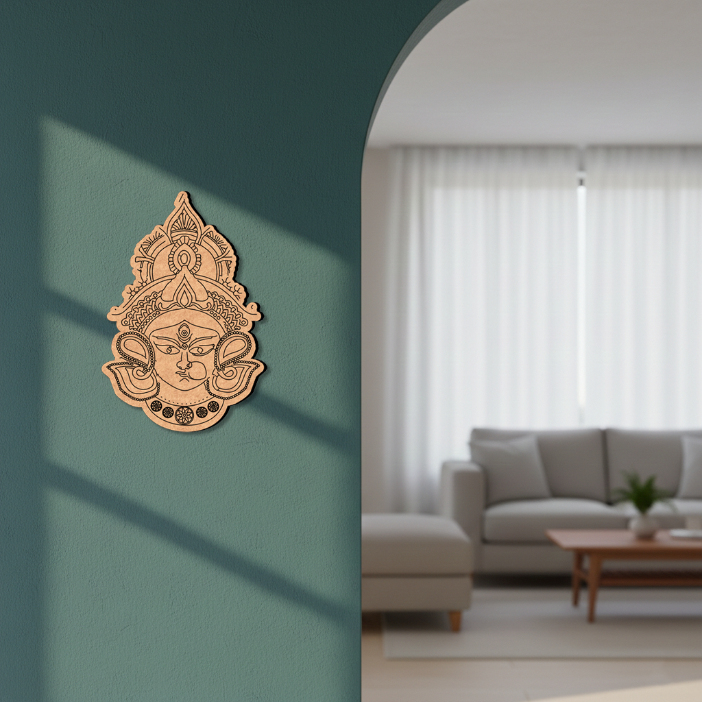 Decorative MDF DIY wall art on a teal wall with a living room in the background