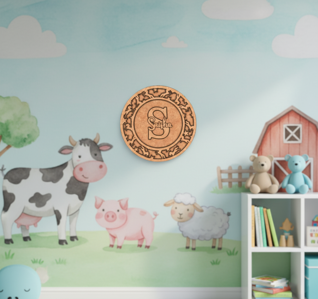 Raw MDF round name plate with engraved “Sasha” design and animal motif border.