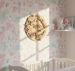 Painted MDF round floral name plate with custom name “Sophie Lynn.” unpainted.