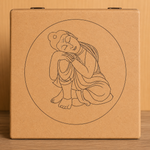 Brown MDF Lock box with a line drawing of a seated buddha figure on a wooden surface.