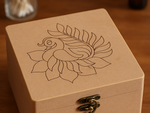 Wooden storage organizer with artistic peacock design – close-up