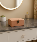 MDF jewelry box on a marble countertop with a blurred background