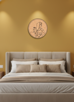 Decorative  MDF DIY wall art of a woman holding a child on a mustard yellow wall above a bed.