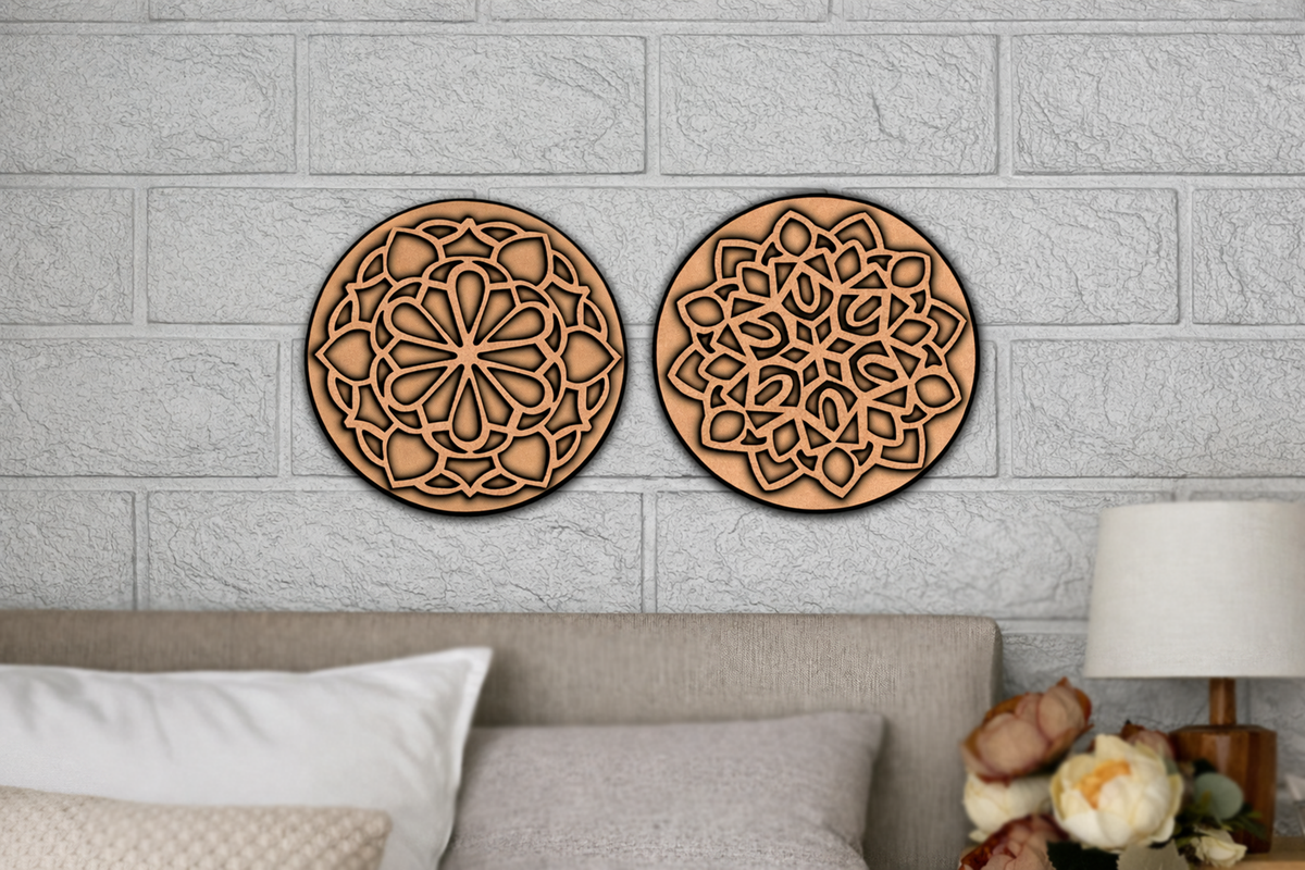 MDF DIY  wall art pieces with intricate patterns on a gray brick wall above a sofa.