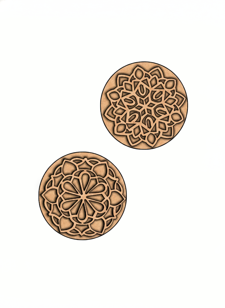 Two MDF DIY  wall art stamps with intricate geometric patterns on a white background