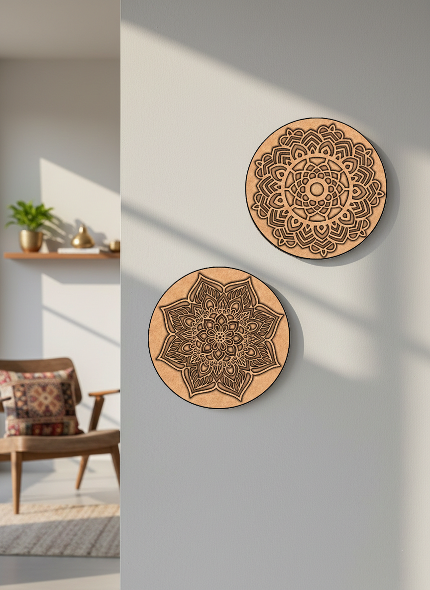 Two MDF DIY wall decor pieces with mandala patterns on a gray wall.