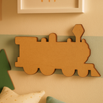 Unpainted MDF steam train engine cutout with multiple rounded wheels, a tall front lamp shape, and simple silhouette details, hanging on wall
