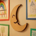MDF crescent moon cutout with smiling face used as wall décor in kids room