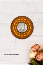 Decorative DIY MDF wall mirror with floral design on a white textured wall.
