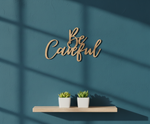 Unpainted MDF Be Careful quote DIY cutout for wall decor and craft projects, mounted on wall