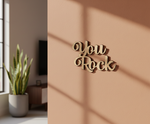 Unpainted MDF You Rock quote laser cut DIY wall decor craft cutout, mounted on wall