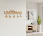 Unpainted MDF Love To Travel quote laser cut DIY wall decor key holder with airplane charms, mounted on wall